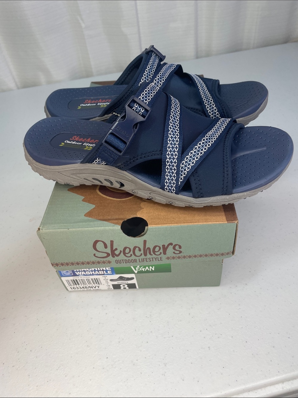 Skechers women’s Navy and White Slip-On Sport Sandals - Picture 2 of 9